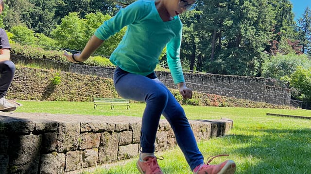 kid-jumping-3-Mt.-Tabor-park-scaled-1.jpeg
